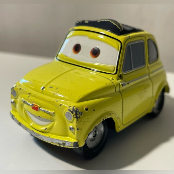 Vintage Disney Pixar Cars yellow Luigi Fiat 500 Cinquecento 1:55 Scale Diecast - Picture 1 of 7